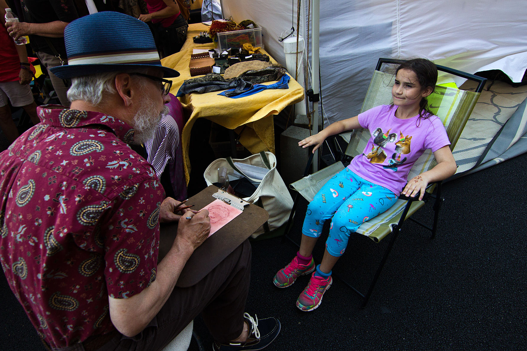 Brian K. Simpson doing a portrait of Margaret Sila